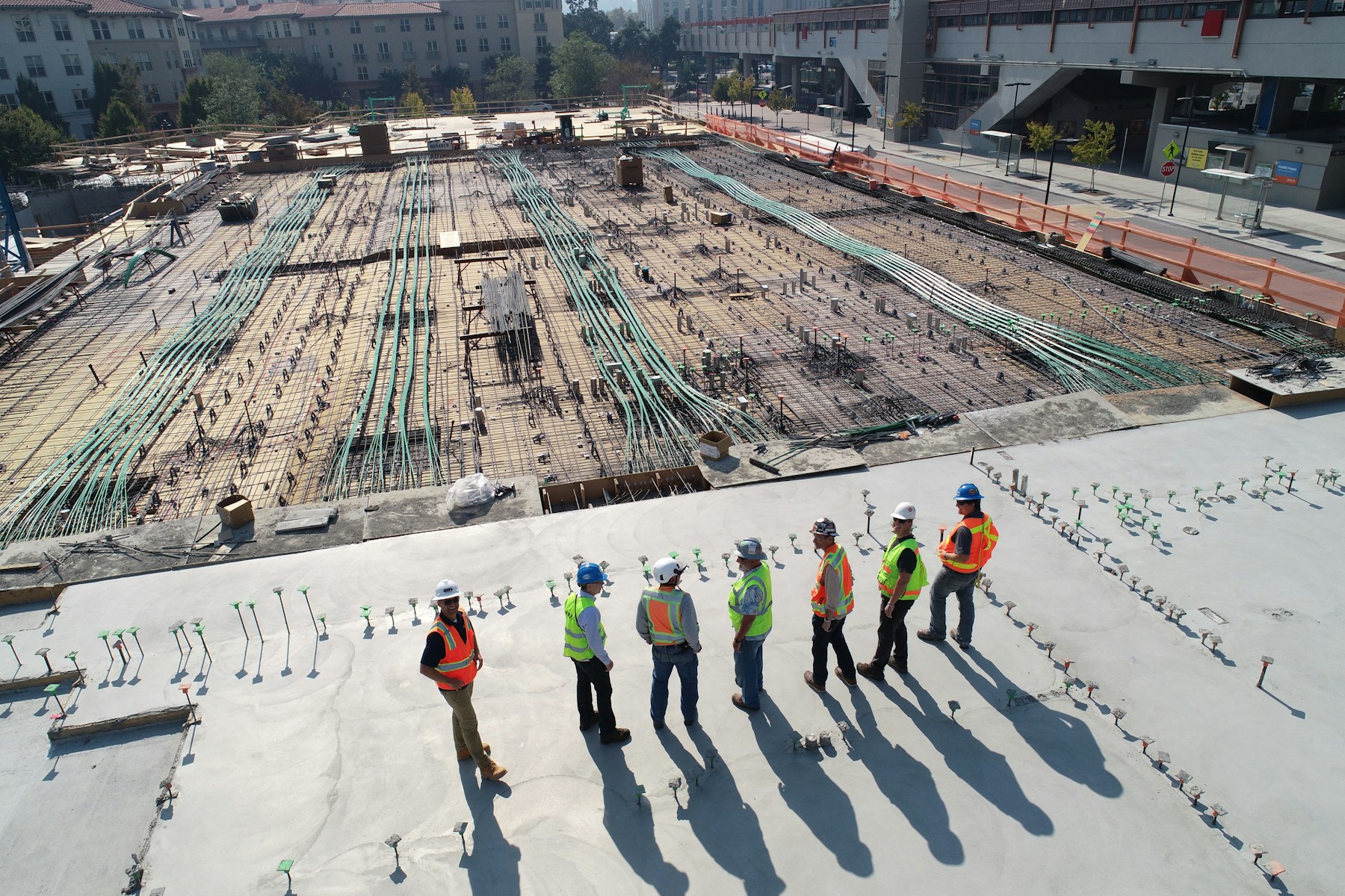 Active commercial construction site requiring coordinated cleanup